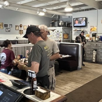 Bearfoot Cafe - Booth seating and fresh squeezed orange juice - American Near Me - Potosi, Missouri