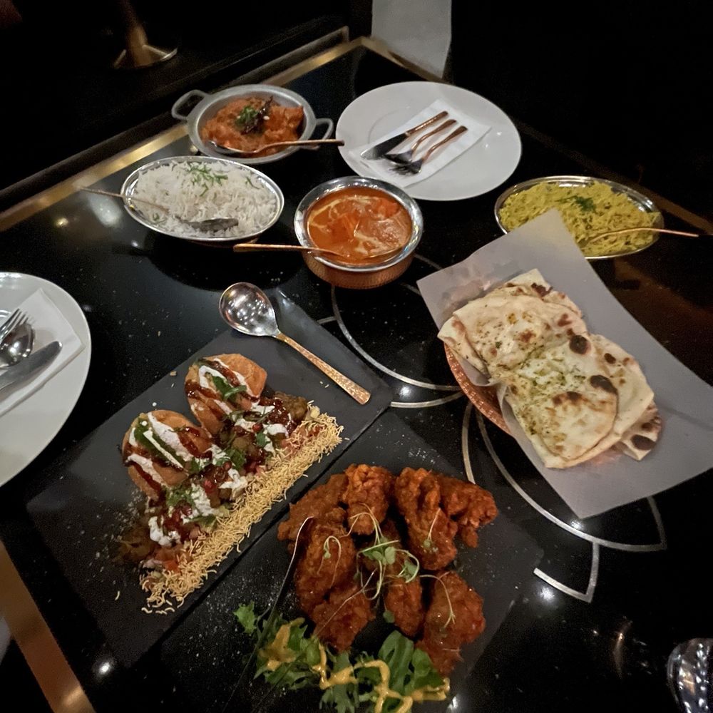 Tasty Indian Bistro - Chicken Tikka Masala Garlic Naan Spicy Chicken Bites Chicken Curry - Indian Near Me - Delta, British Columbia Tasty Indian Bistro - Chicken Tikka Masala Garlic Naan Spicy Chicken Bites Chicken Curry - Indian Near Me - Delta, British Columbia