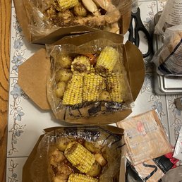 Shrimp, Scallops, Crab Legs, Corn and Potatoes Shrimp, Scallops, Crab Legs, Corn and Potatoes