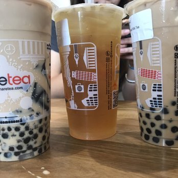 Sharetea - Left - QQ Happy Family (half sugar, half ice) Back - Wintermelon Tea Right - Okinawa Pearl Milk Tea - Coffee & Tea Near Me - Plano, Texas Sharetea - Left - QQ Happy Family (half sugar, half ice) Back - Wintermelon Tea Right - Okinawa Pearl Milk Tea - Coffee & Tea Near Me - Plano, Texas