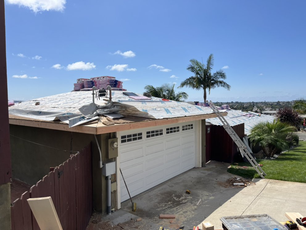 Slide of The Roofing Company