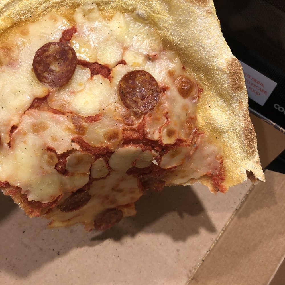 Zizzi - Bland undercooked margharita pizza missing fresh basil with unseasoned flavorless tomato sauce - Italian Near Me - Dublin, D Zizzi - Bland undercooked margharita pizza missing fresh basil with unseasoned flavorless tomato sauce - Italian Near Me - Dublin, D