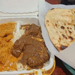 Fiza Restaurant - Chicken and Beef korma over rice with Naan.