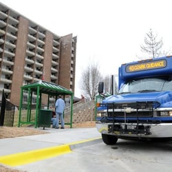 Ozark Regional Transit - Ozark Regional Transit bus at Hillcrest Towers' new bus shelter in downtown Fayetteville