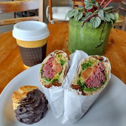 Java On Ocean Coffee House - Pastrami sandwich with avocado on rye. Macaroon. Small coffee. Plant.