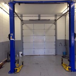 Newly installed 2 post lift for our full service bay including state inspections coming soon.