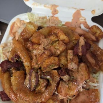 Bodega City - KLK adobo fries w/ onion rings - Sandwiches Near Me - Brooklyn, New York Bodega City - KLK adobo fries w/ onion rings - Sandwiches Near Me - Brooklyn, New York