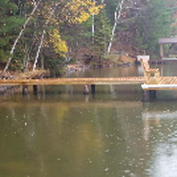 Dock Doctors General Contracting - a dock on a lake - Landscaping Near Me - Conover, Wisconsin