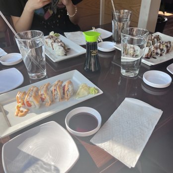Sushi Cafe - spicy tuna roll, calamari roll, shrimp tempura roll, and eel roll - Japanese Near Me - Duluth, Georgia