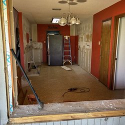 Morris Painting & Renovations - This is a picture of the entire kitchen after demolition. That was the window removed at the front of picture.
