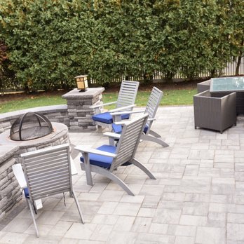 Total Concepts - a patio with a fire pit - Landscaping Near Me - Colts Neck, New Jersey