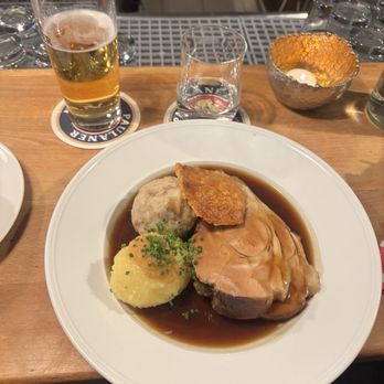 Wirtshaus Maxvorstadt - Bavarian Pork, Pureed Potatoes, Pretzel Dumpling, topped with a Fried Pork Skin. - Bavarian Near Me - Munich, BY Wirtshaus Maxvorstadt - Bavarian Pork, Pureed Potatoes, Pretzel Dumpling, topped with a Fried Pork Skin. - Bavarian Near Me - Munich, BY