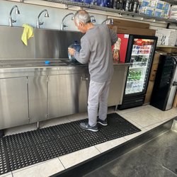 Zoulal Water - He cleaned the container to a spotless finish before filling it up. Premium service right there!!
