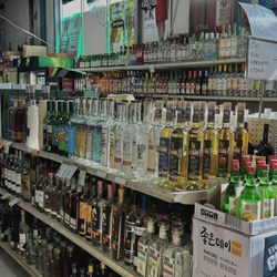 Kelly Liquor Barn - Mezcal! Ft our wall of vodka in the back.