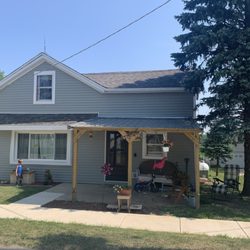 Quinn Construction - Siding completed - mastic Scottish Thistle