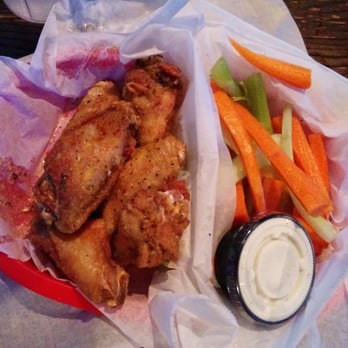 North River Tavern - 6 lemon pepper wings with ranch, carrots + celery delicious even at midnight. - Dive Bars Near Me - Sandy Springs, Georgia North River Tavern - 6 lemon pepper wings with ranch, carrots + celery delicious even at midnight. - Dive Bars Near Me - Sandy Springs, Georgia