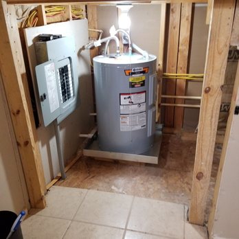 John Moore Services - The new water heater - Plumbing Near Me - Houston, Texas