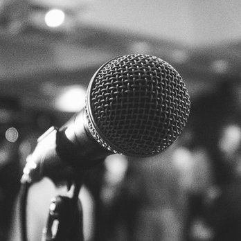 Patent Social - a microphone in front of a crowd - Bars Near Me - Waterloo, Ontario Patent Social - a microphone in front of a crowd - Bars Near Me - Waterloo, Ontario