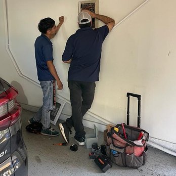 Nation Electric and Construction - Mehdi with his assistant - Electricians Near Me - Los Angeles, California Nation Electric and Construction - Mehdi with his assistant - Electricians Near Me - Los Angeles, California