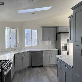 Straight Edge Builders - a kitchen with gray cabinets - Flooring Near Me - Redlands, California