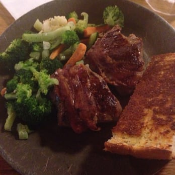 Steer'n Stein - Bacon wrapped tri-tip filet with steamed veggies and garlic bread - Steakhouses Near Me - Moreno Valley, California Steer'n Stein - Bacon wrapped tri-tip filet with steamed veggies and garlic bread - Steakhouses Near Me - Moreno Valley, California