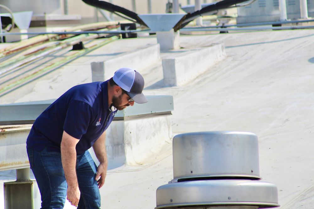 Slide of Roof Experts-McKinney