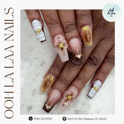 Ooh La Laa Nails - This nail design features a soft nude base paired with white accents and delicate gold details for a classy and sophisticated look. Hand-pai