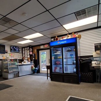 Duss Avenue Cafe - Why are the stuffed animal chickens on top of the beverage cooler? - Chicken Wings Near Me - Ambridge, Pennsylvania Duss Avenue Cafe - Why are the stuffed animal chickens on top of the beverage cooler? - Chicken Wings Near Me - Ambridge, Pennsylvania