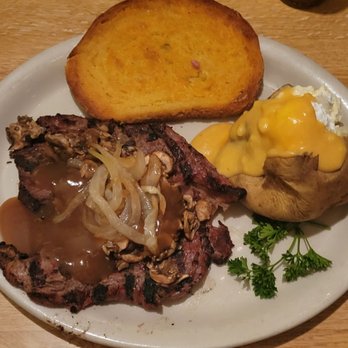 Steak Corral - Ribeye steak, garlic bread, and bake potatoes with toppings. - Steakhouses Near Me - Whittier, California Steak Corral - Ribeye steak, garlic bread, and bake potatoes with toppings. - Steakhouses Near Me - Whittier, California