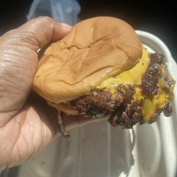 Burger Schmurger - Size compared to my hand. Needs to be bigger - Burgers Near Me - Dallas, Texas
