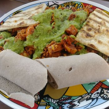 Heat Da Spot - Ethiopian breakfast with pita & injera topped with that bomb secret sauce! So delicious! - Coffee & Tea Near Me - Washington, DC, District of Columbia