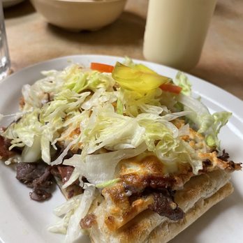 Restaurant AA - a plate of food and a glass of milk - Hot Dogs Near Me - Montreal, Quebec