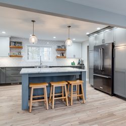 Reico Kitchen & Bath - Combine white wall cabinets with grey base cabinets for a crisp two-finish kitchen!