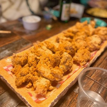 Ehwa J Bar - a tray of fried chicken on a table - Bars Near Me - Toronto, Ontario