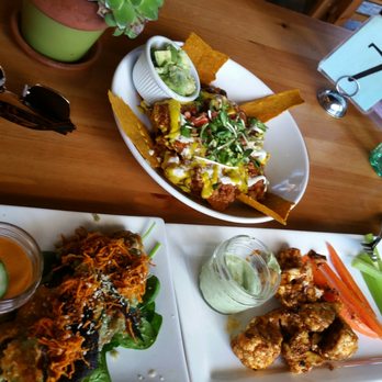 Trilogy Sanctuary - Nachos, cauliflower wingz and spring rolls! - Juice Bars & Smoothies Near Me - La Jolla, California Trilogy Sanctuary - Nachos, cauliflower wingz and spring rolls! - Juice Bars & Smoothies Near Me - La Jolla, California