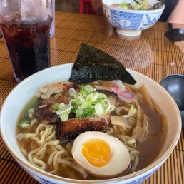 Tonkotsu  Chashu Pork belly, pickled bamboo shoot, steamed bok choy, soft boiled egg, nori seaweed, scallion & ramen noodles in pork broth