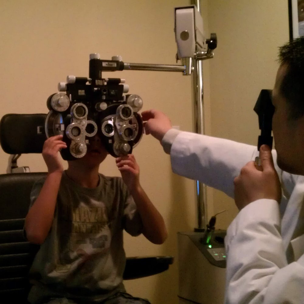 Focus Optometry - Jonah getting his eyes checked with Dr. Toy - Optometrists Near Me - Milpitas, California