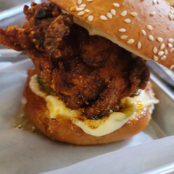 New Holland Brewing - A huge nashville hot chicken sandwich - New American Near Me - Holland, Michigan