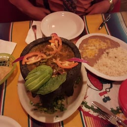 a plate of mexican food on a table a plate of mexican food on a table