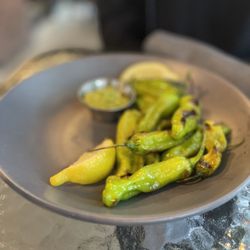Hugo's Bar and Grill - Shishito peppers app special