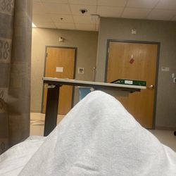 Surgery Center of Aventura - Waiting in the surgical prep area which was chaotic today ! I felt bad for The nurses so I didn't bitch or bother them