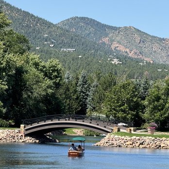 The Broadmoor - pond with walking bridge - Resorts Near Me - Colorado Springs, Colorado The Broadmoor - pond with walking bridge - Resorts Near Me - Colorado Springs, Colorado