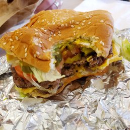 Cheesburger... lettuce, tomato, extra pickles, and mustard.