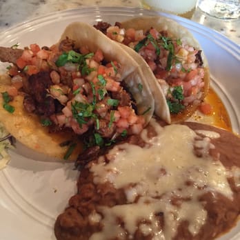 Verde - This is the delicious al pastor tacos with a side of beans! Highly recommended! - Mexican Near Me - Lihue, Hawaii Verde - This is the delicious al pastor tacos with a side of beans! Highly recommended! - Mexican Near Me - Lihue, Hawaii