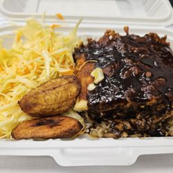 Chris Jerk Caribbean Bistro - Jerk Chicken Mac n' Cheese served with coleslaw