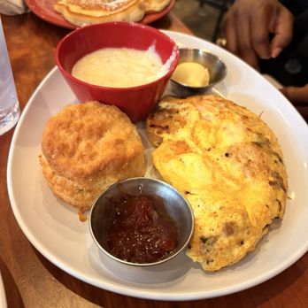 Ruby Slipper Central Business District - Shrimp Omelet, grits and biscuit with a pancake on the side! Just know that plate was wiped clean! - Breakfast & Brunch Near Me - New Orleans, Louisiana Ruby Slipper Central Business District - Shrimp Omelet, grits and biscuit with a pancake on the side! Just know that plate was wiped clean! - Breakfast & Brunch Near Me - New Orleans, Louisiana