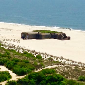 Cape May Lighthouse - View of the huge concrete bunker built as a military structure during WWII...still sitting out on the beach in Cape May. - Museums Near Me - Cape May Point, New Jersey