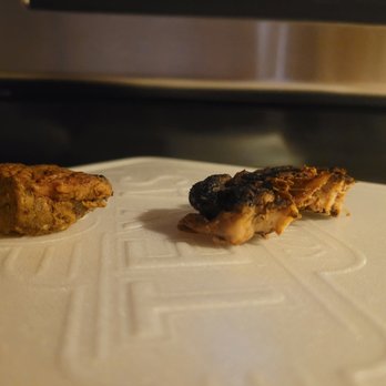 Texas Roadhouse - two pieces of chicken on a cutting board - Seafood Near Me - Florence, Kentucky Texas Roadhouse - two pieces of chicken on a cutting board - Seafood Near Me - Florence, Kentucky