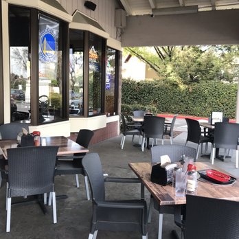 High Five Pizza - Outside seating also has a TV - Pizza Near Me - San Jose, California