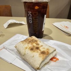 Dunkin' - Medium iced coffee $3.84 chicken & roasted pepper Dunkin' wrap $5.04